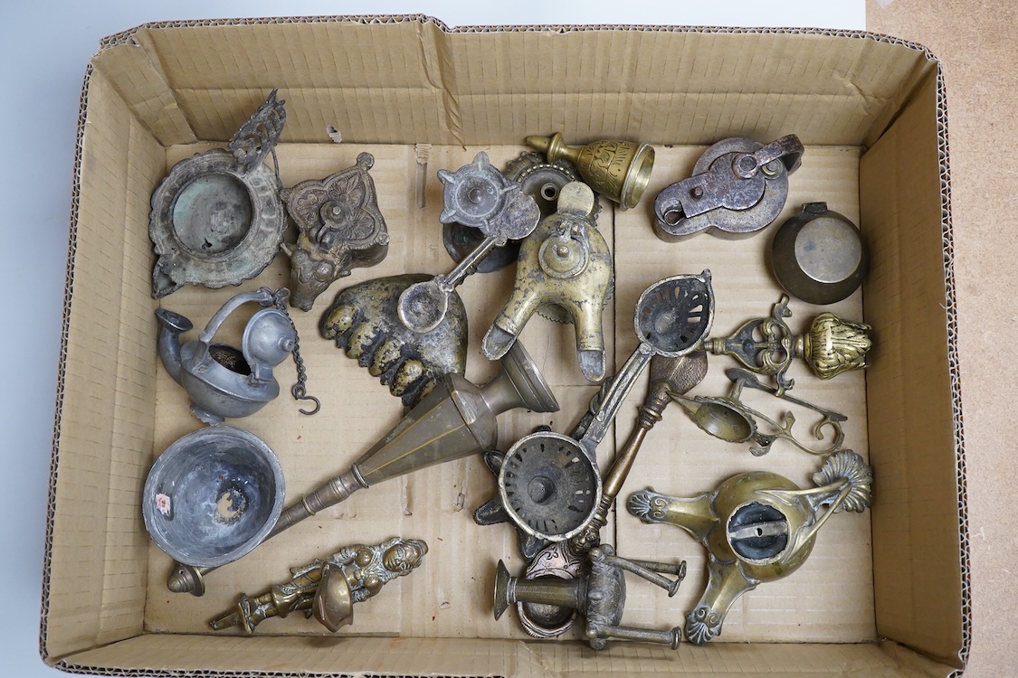 A group of small Middle Eastern mixed metalware lamps, burners etc